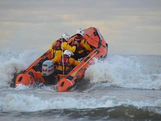 Lifeboat crew got to them in the nick of time - within the hour the cave would have flooded.