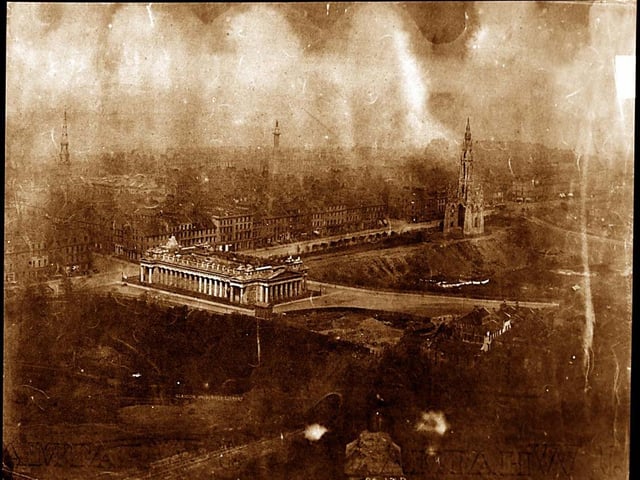 This view from the ramparts of Edinburgh Castle shows the Scott Monument occupying a very different looking Princes Street.