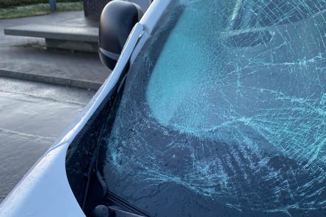 Damage to Martin's work van.