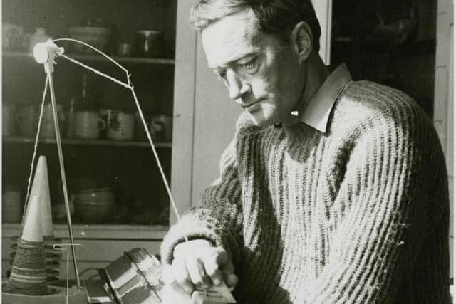 Len Whatley, pictured here in 1961 at a knitting machine. PIC: Whatley Collection.